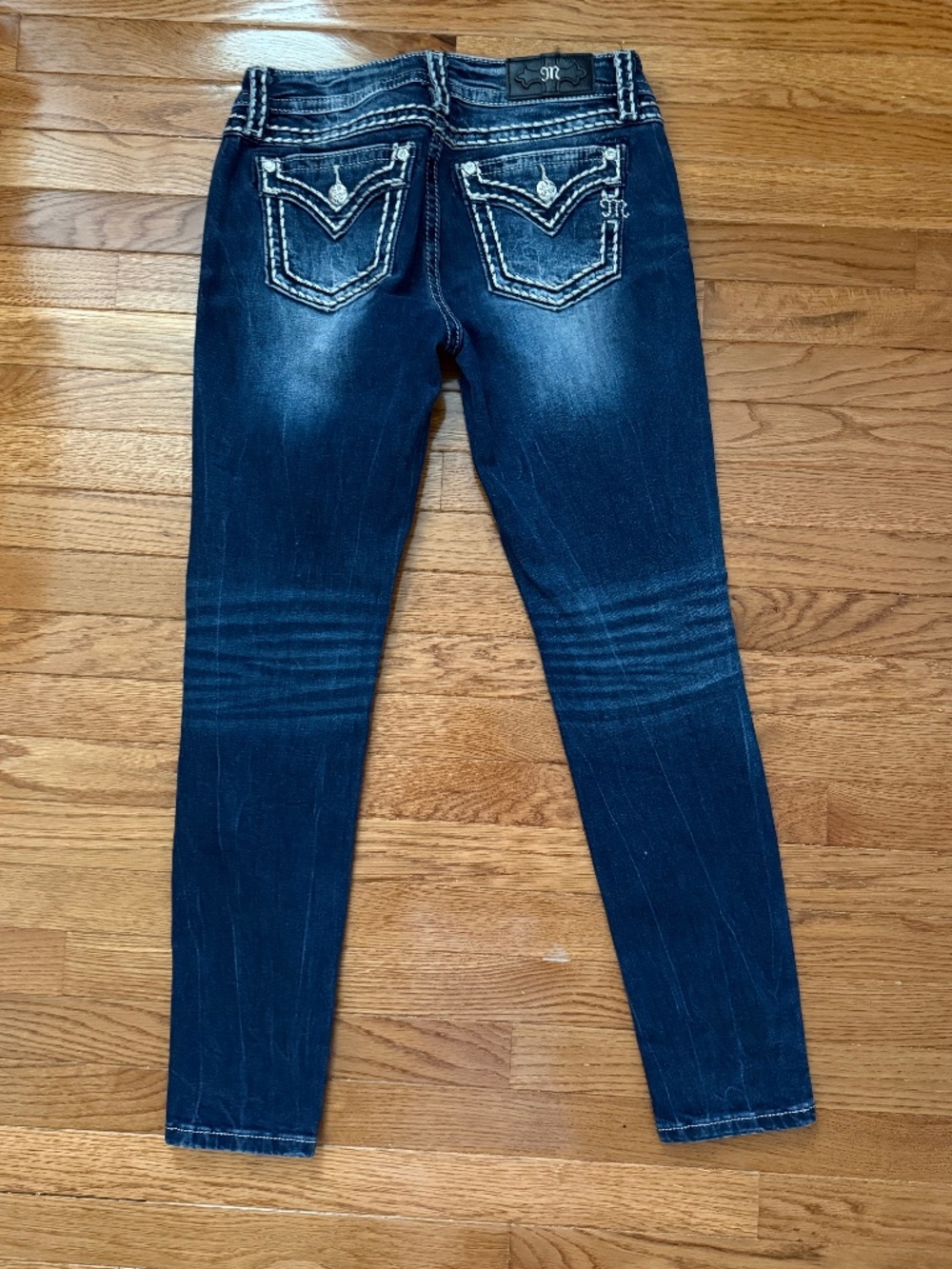 Miss Me Hailey Skinny Cut Jean with thick stitches. Size is 28.